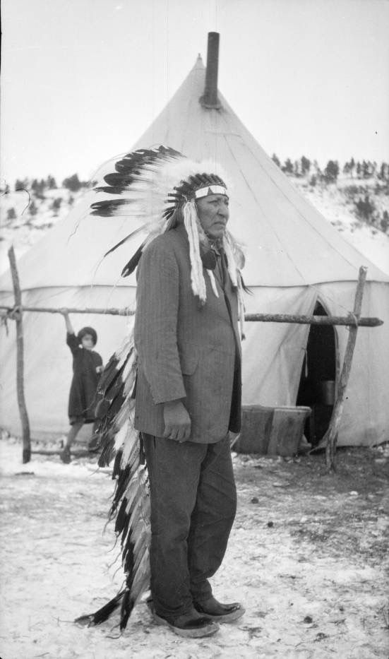Cheyenne Man Wearing An Eagle Feather Headdress Suit And
