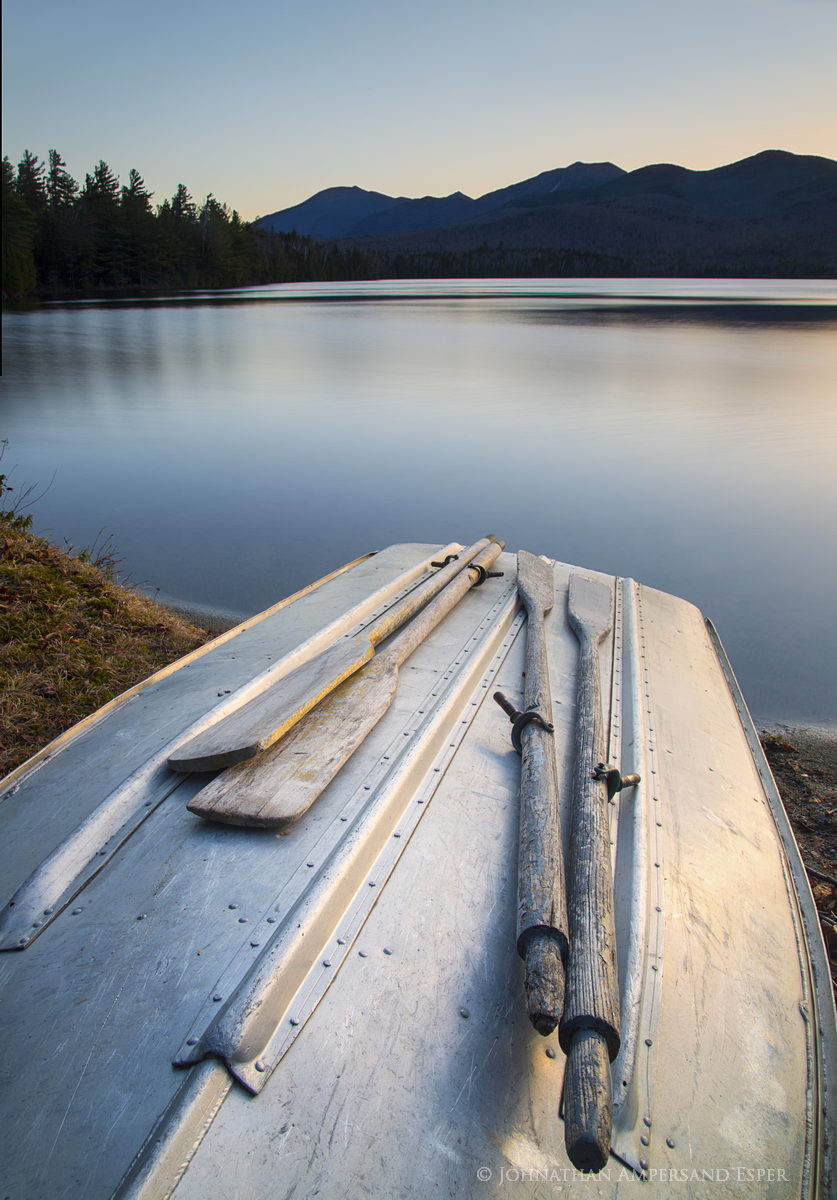 Clear Pond Rowboat And Oars With Dix Range In Background