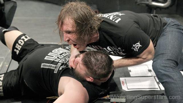 Dean Ambrose Holding Kevin Owens From Neck