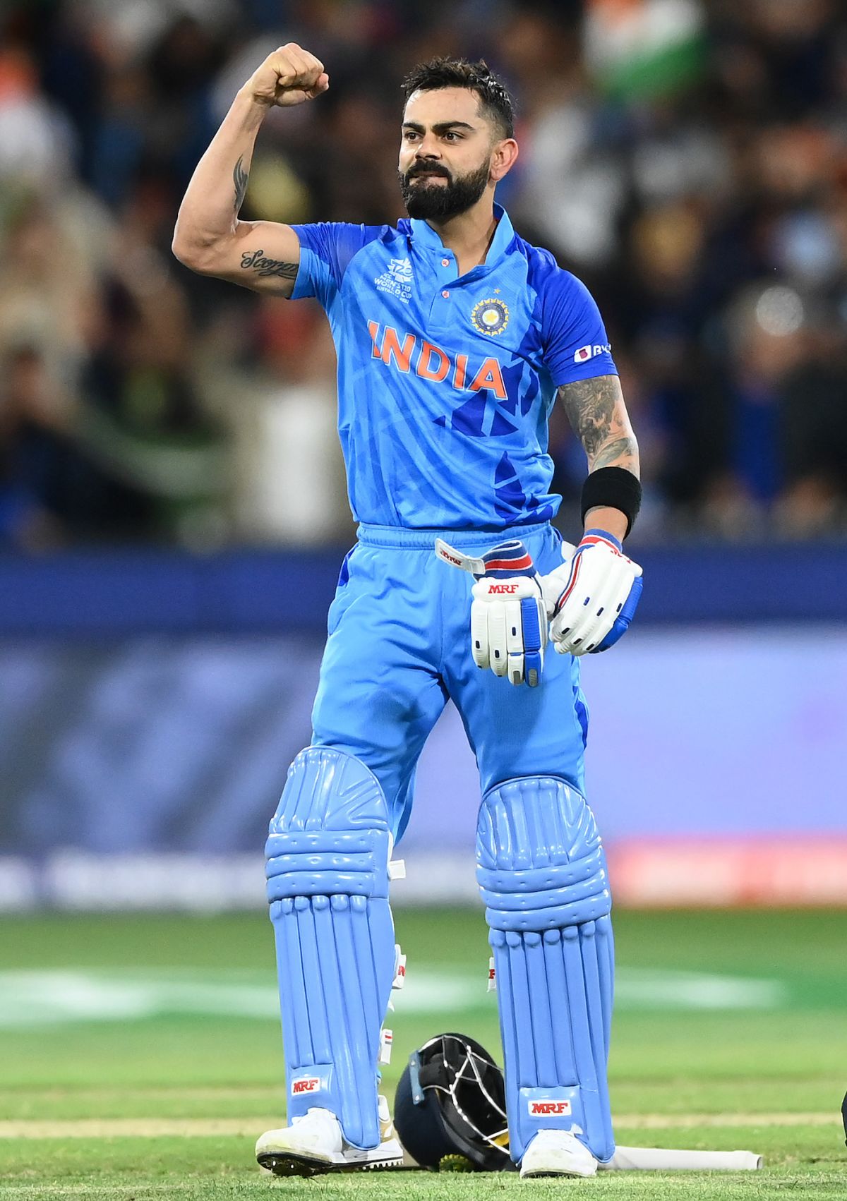 Virat Kohli Celebrates An Iconic Innings And Victory Wallpaper