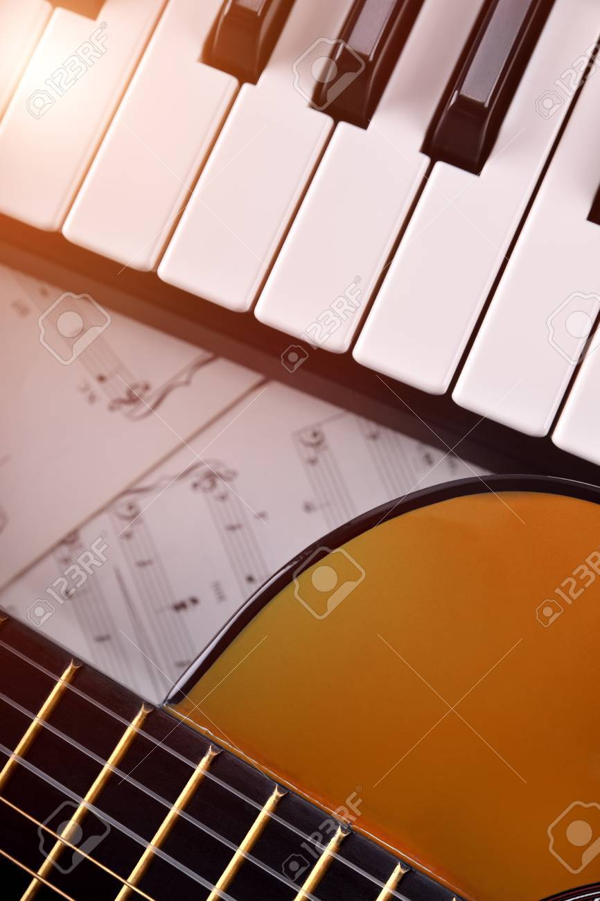 Piano And Guitar With Shine Sheet Music Background Vertical