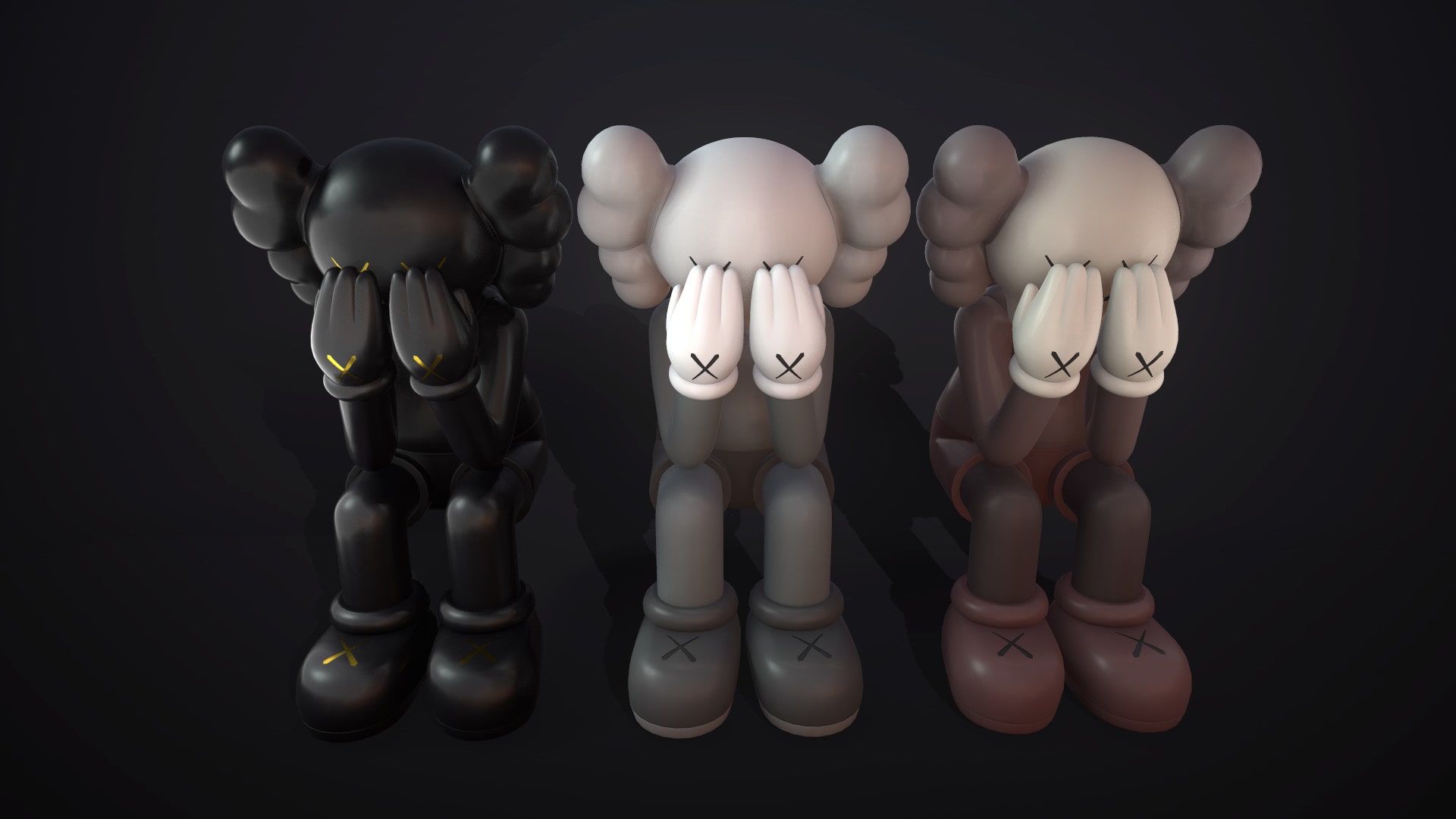 Three Kaws Companion figures sitting down, covering their faces with their hands, in black, gray, and brown color variations against a dark background