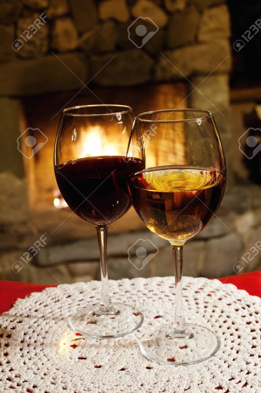 Two Glasses Of Red White Wine Fireplace Chimney Background