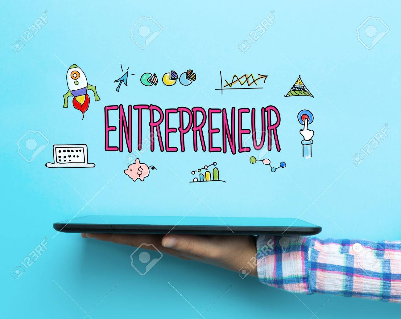 Entrepreneur Concept With A Tablet On Blue Background Stock Photo