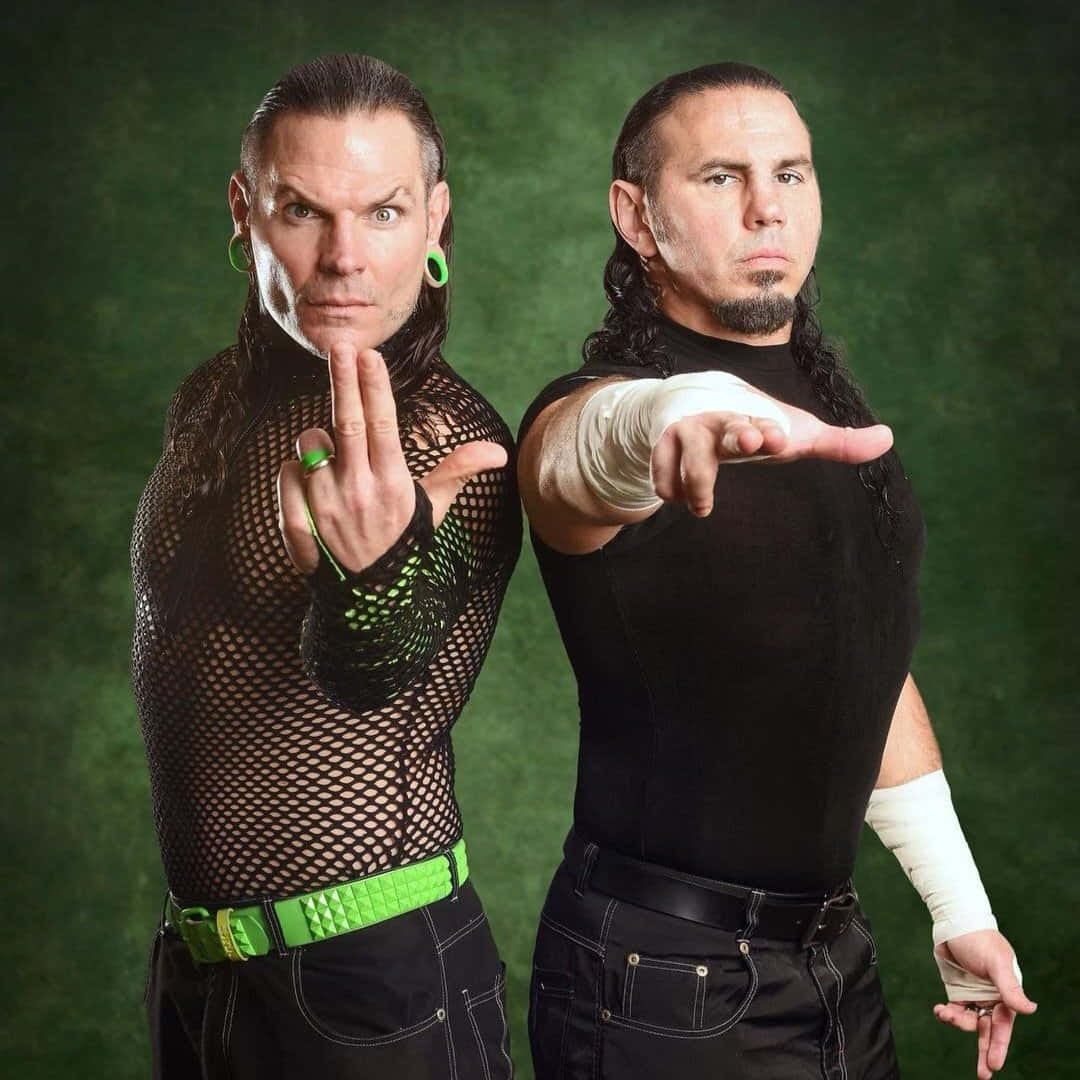 Matt Hardy And Jeff In Aew Wrestling Action Wallpaper