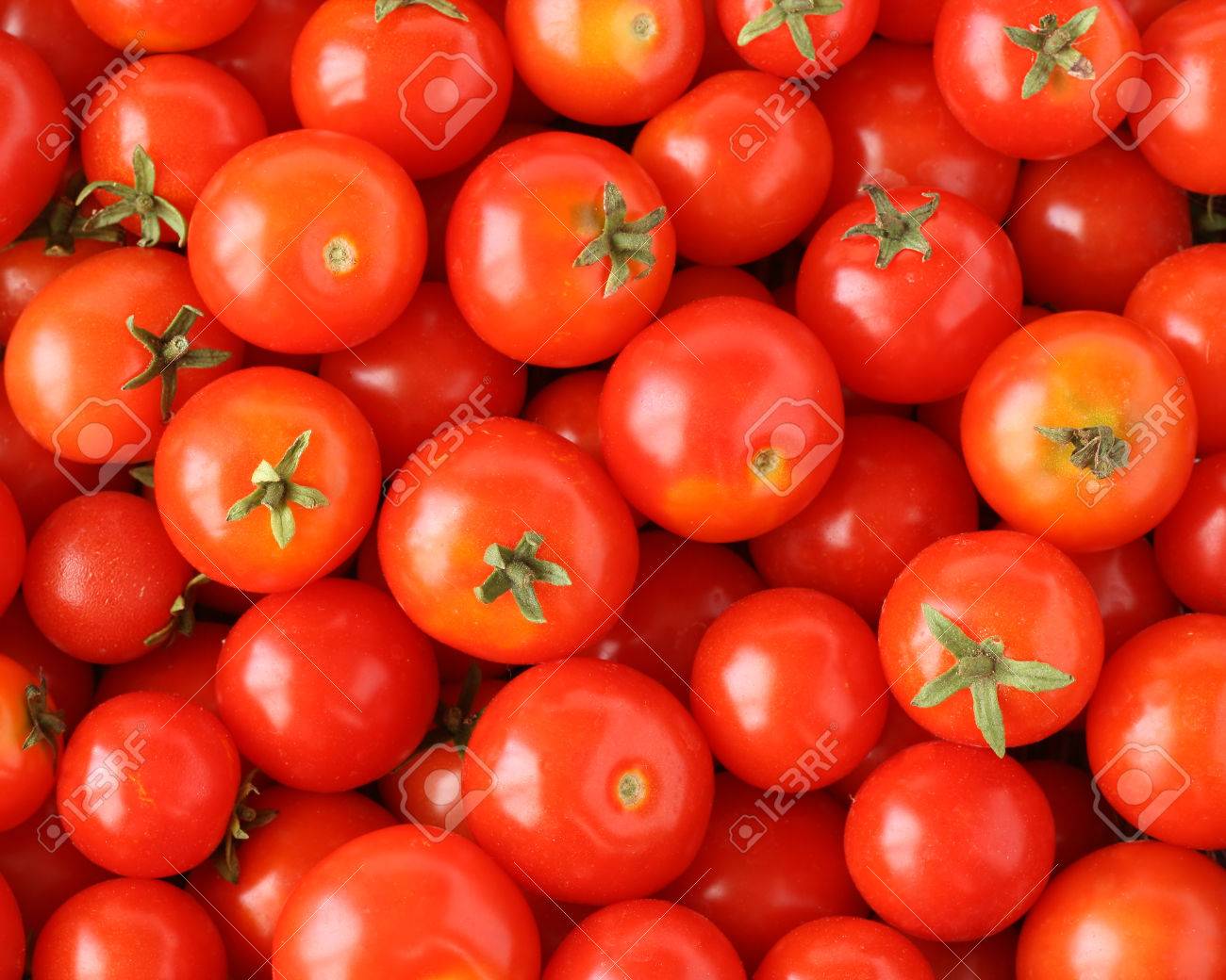 Organically Grown Red Cherry Tomatoes Background Stock Photo