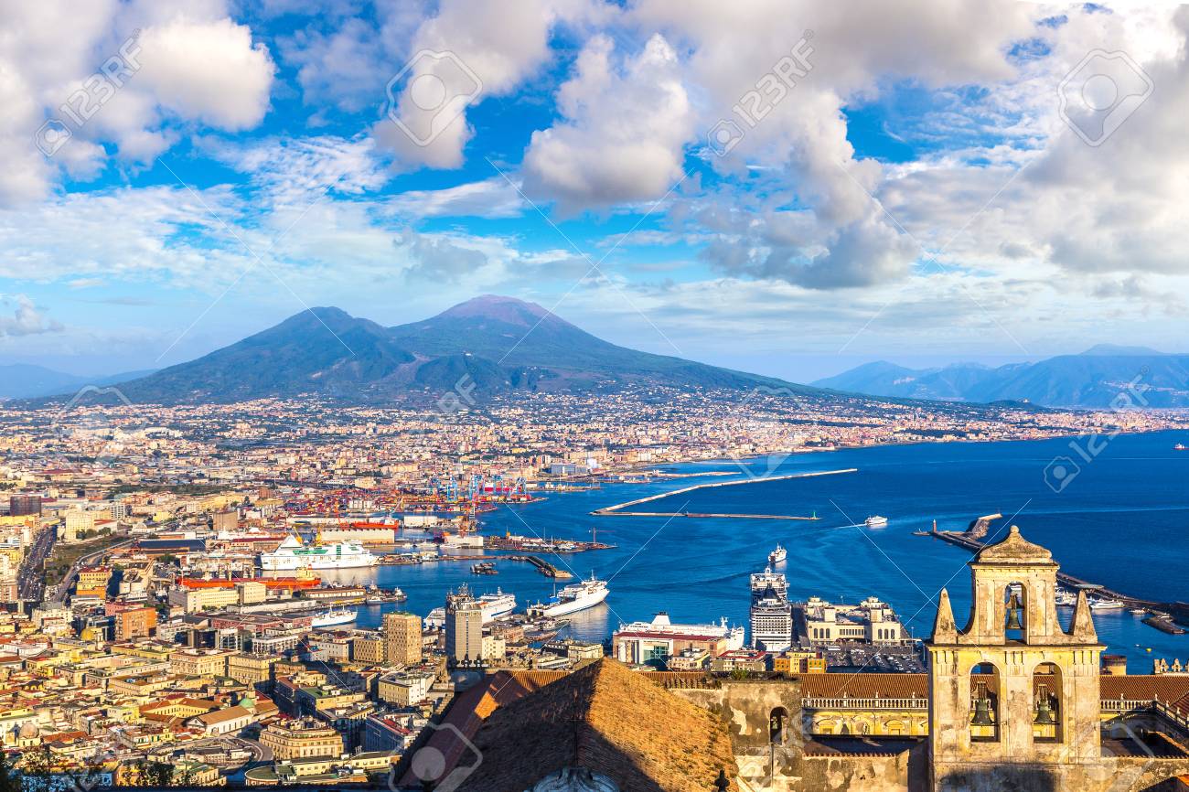 Napoli Naples And Mount Vesuvius In The Background At Sunset