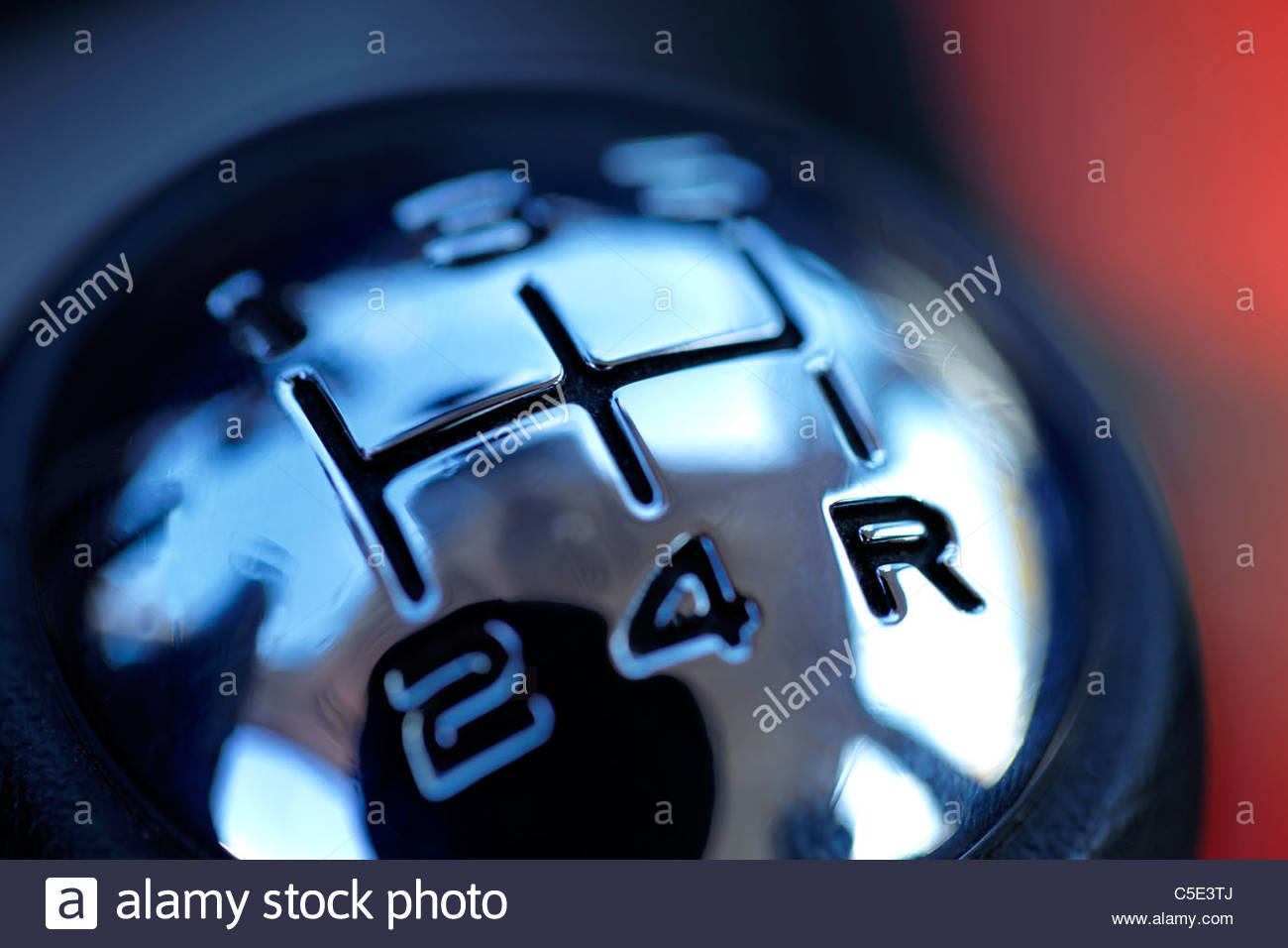 Close Up Of A Shift Knob Against Blurred Background Stock Photo
