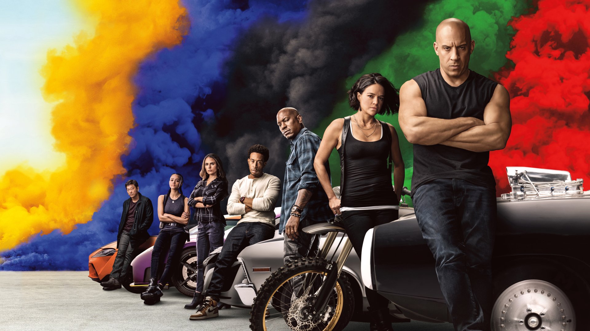 Promotional poster for the 'Fast X' movie, featuring the main cast and vehicles