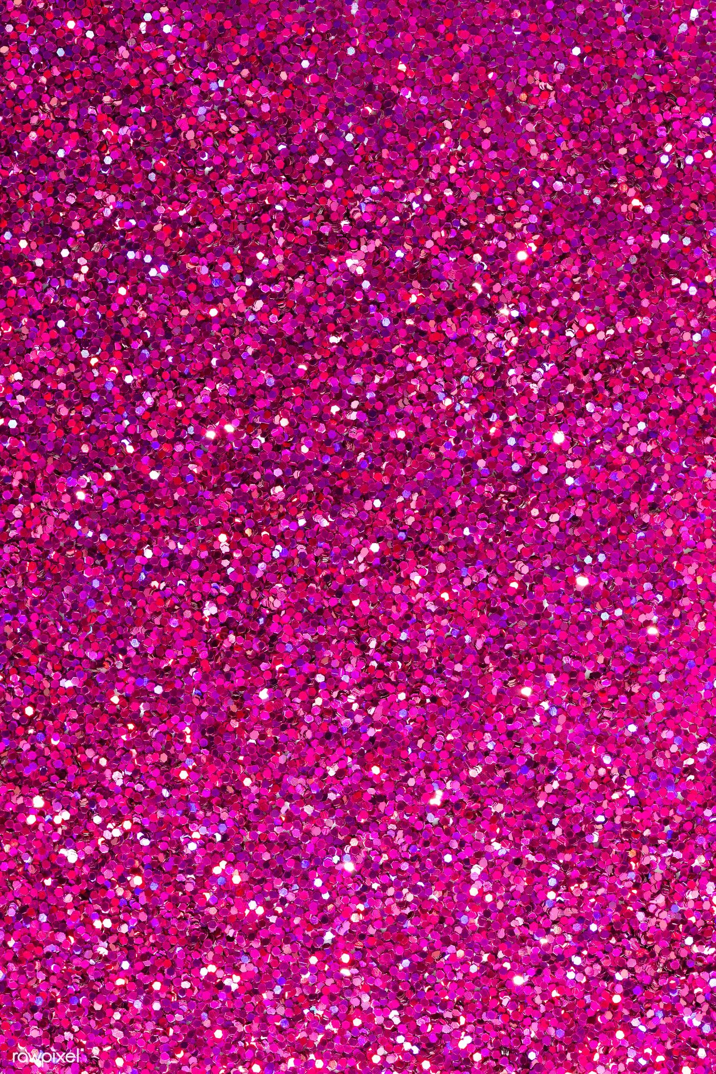 Close-up of vibrant pink glitter, creating a sparkly and textured background