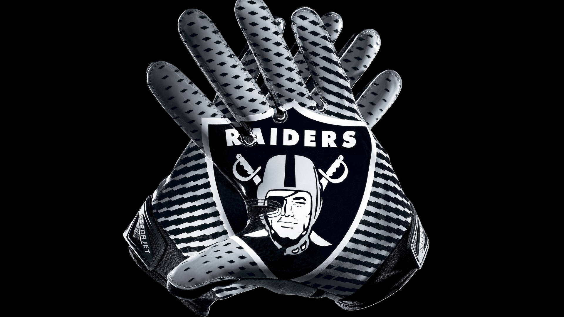 Close-up of Las Vegas Raiders gloves with team logo