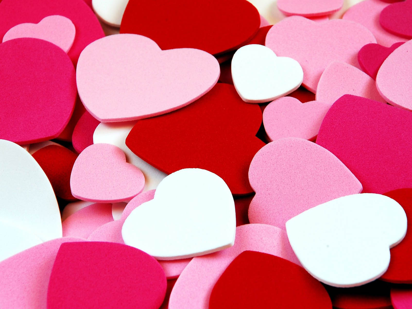 Close-up of colorful heart shapes, ideal for Valentine's Day or romantic themes