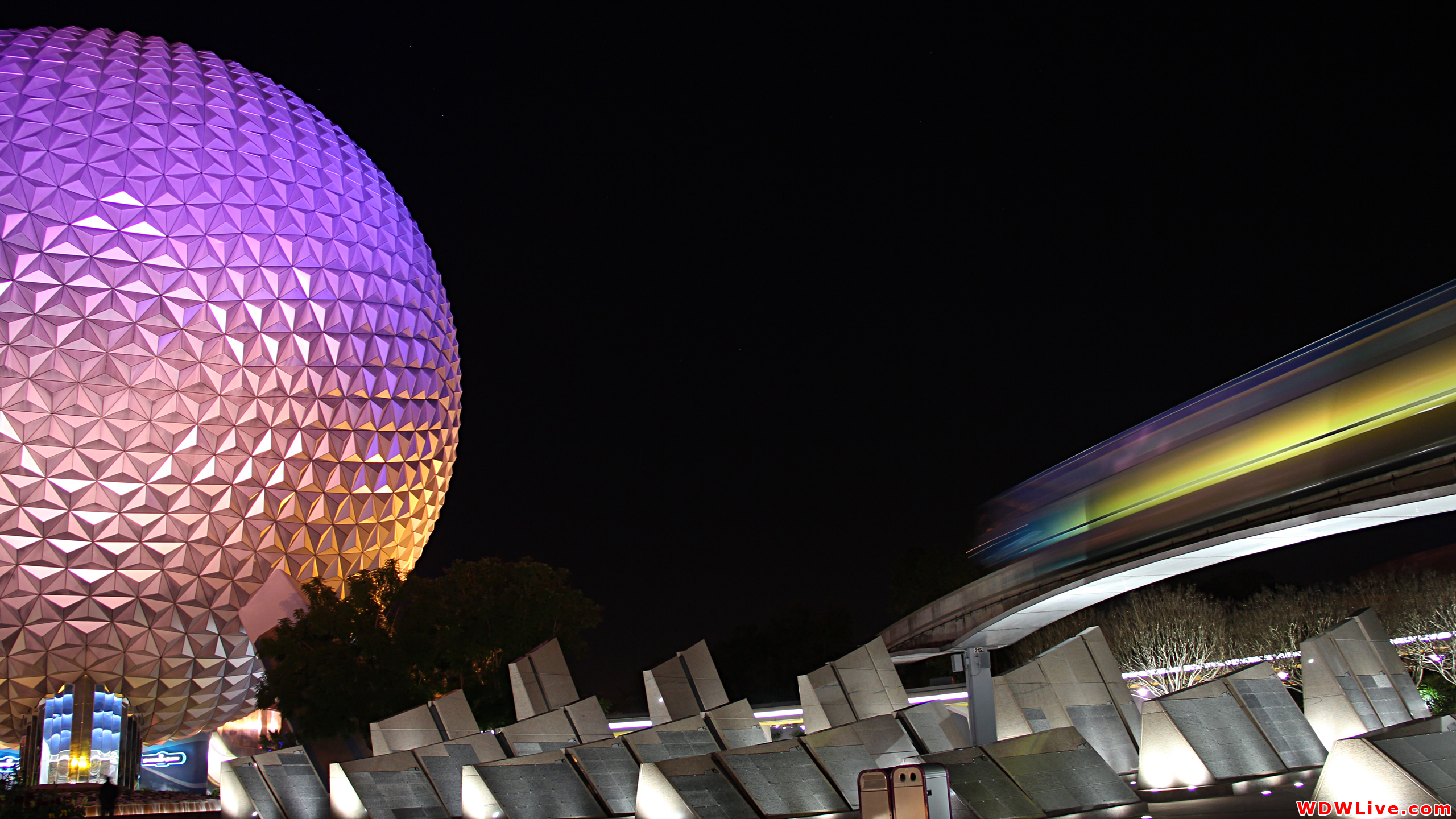 Spaceship Earth Nighttime Of The Tron Monorail Passing Through