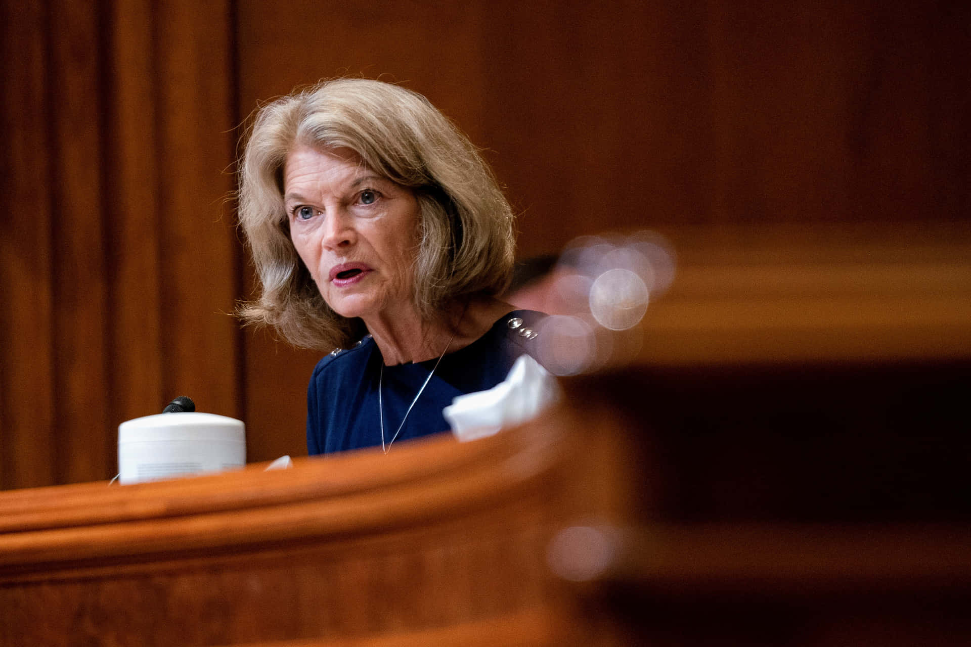 Senator Lisa Murkowski Looking Serious During A Public Event Wallpaper