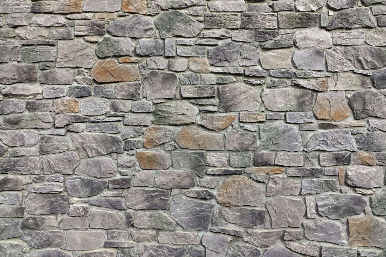 Modern Textured Grey Yellow Stonewall Made From Flagstone And