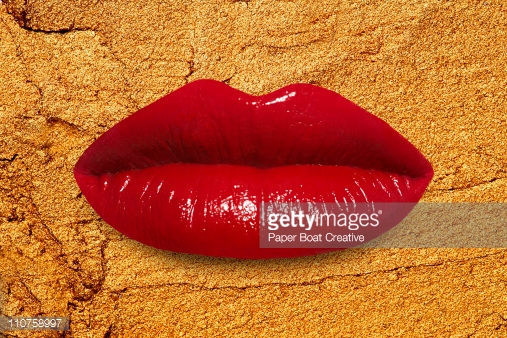 Bright Red Lips Against A Golden Makeup Background Stock Photo Getty