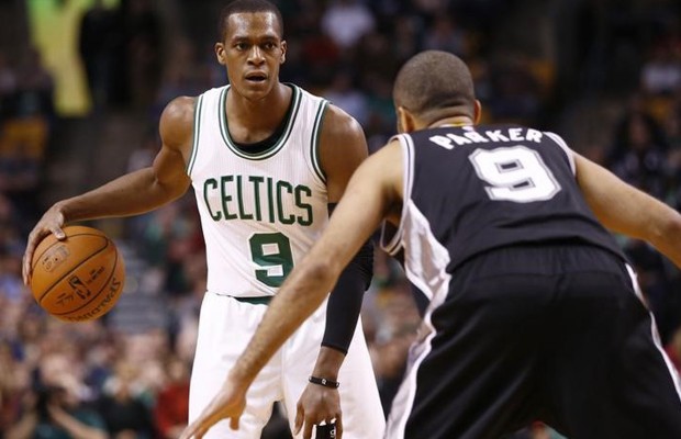Traded Boston Celtics Guard Rajon Rondo Dribbles The Ball Against