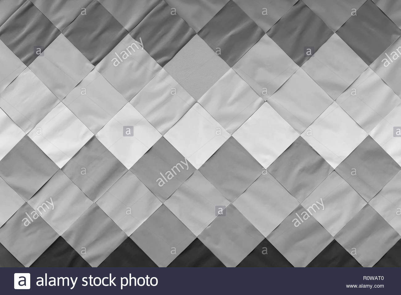 Abstract background from white gray and black paper pattern