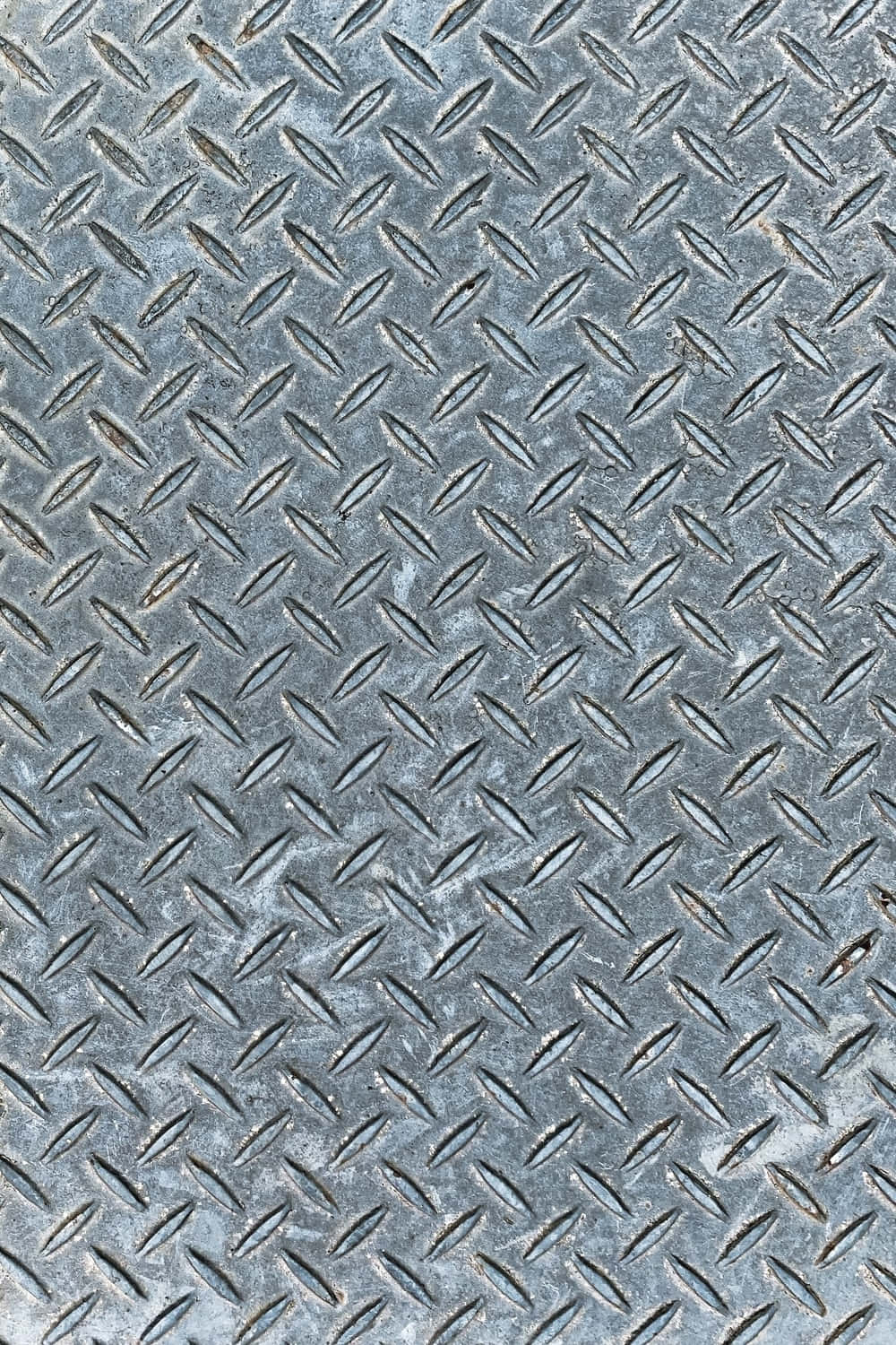 A Close Up Of Metal Diamond Plate Wallpaper