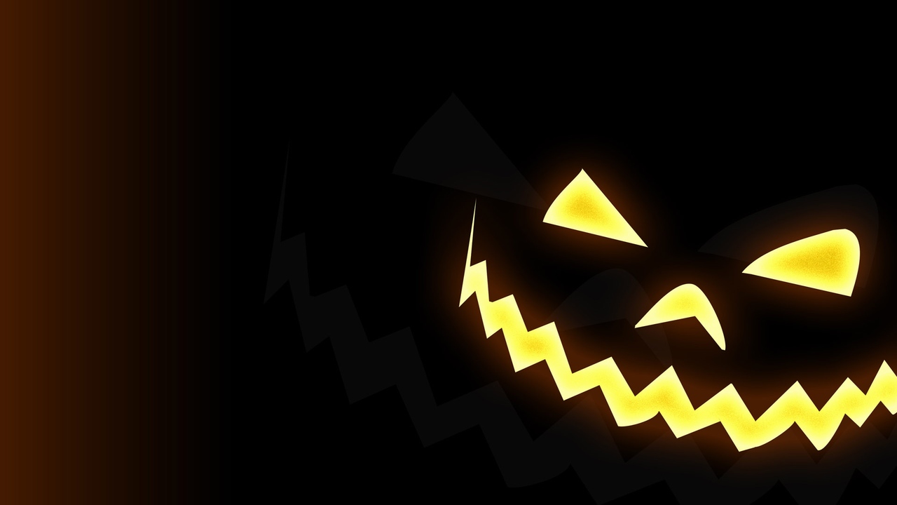 Black Wallpaper Of A Jack O Lantern In Halloween Holiday