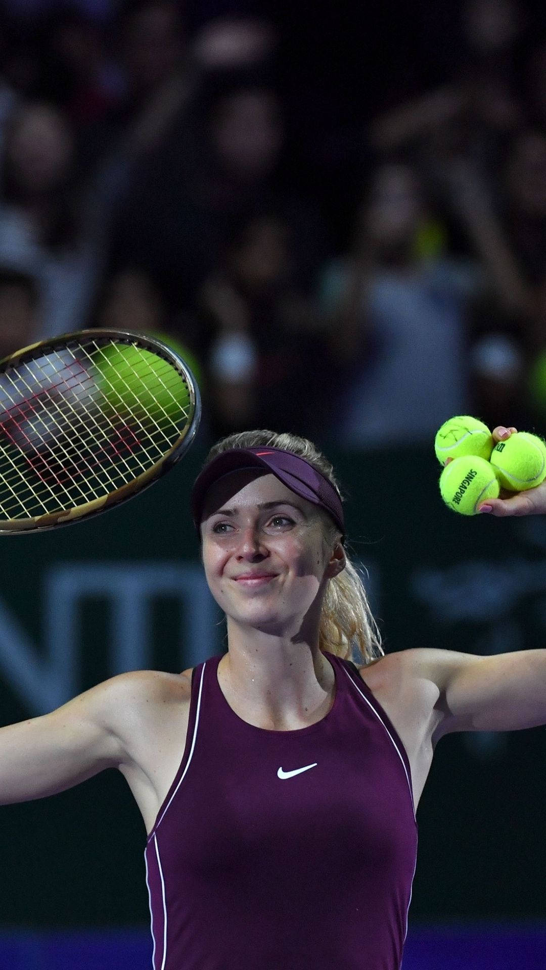 Elina Svitolina Holding Racket And Balls Wallpaper