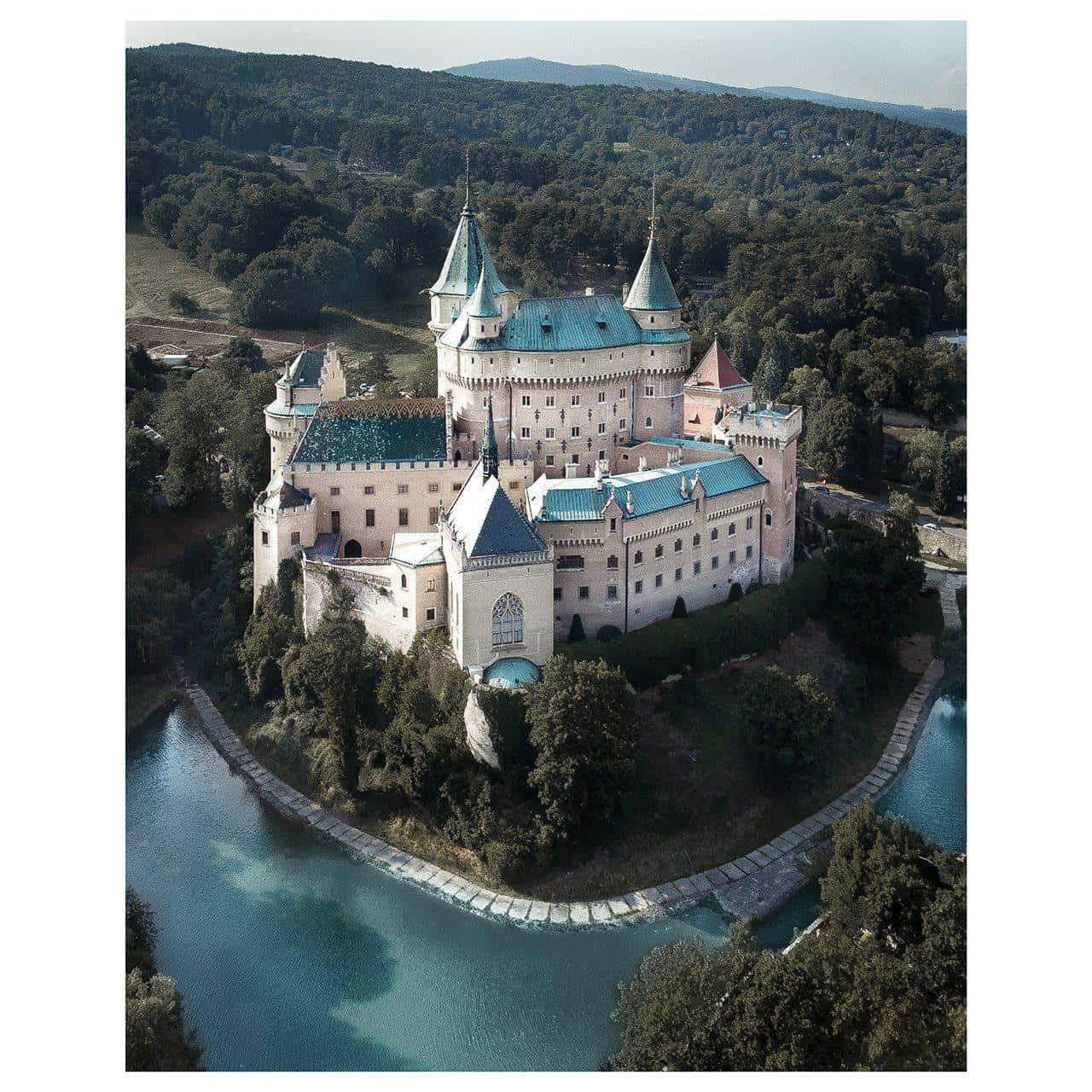 Scenic Of Bojnice Castle Under Clear Blue Sky Wallpaper
