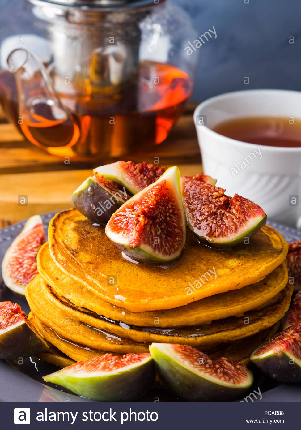 Stack Of Pumpkin Pancakes With Figs And Honey Hot Tea Autumn