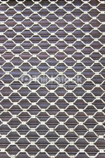 Iron Window Screen Grid Over Wooden Blinds Background Photo