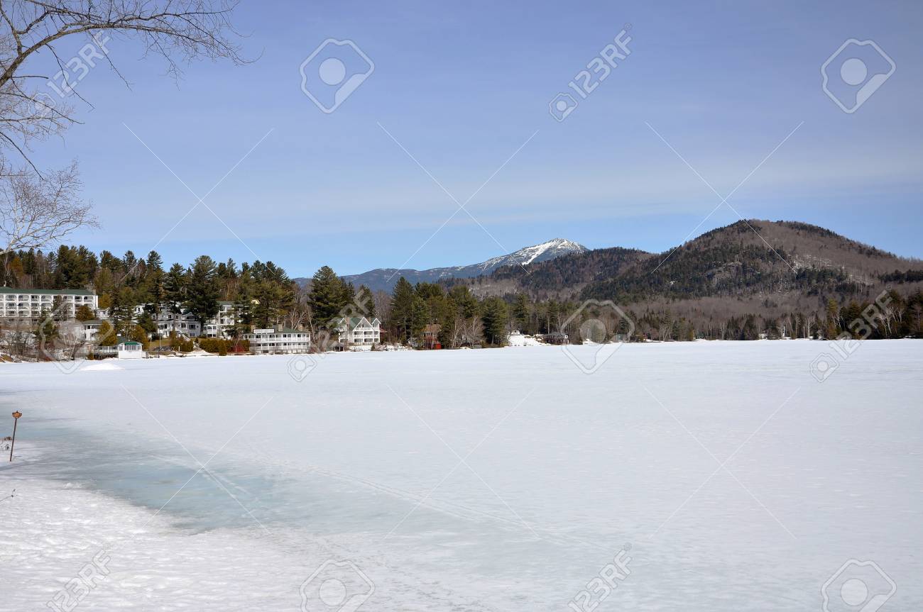 Mirror Lake In Winter With Whiteface Mountain At The Background