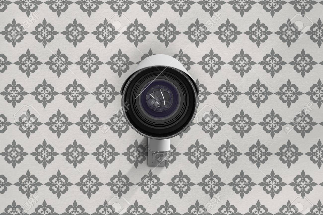 Cctv Camera Against Grey Wallpaper Stock Photo Picture And