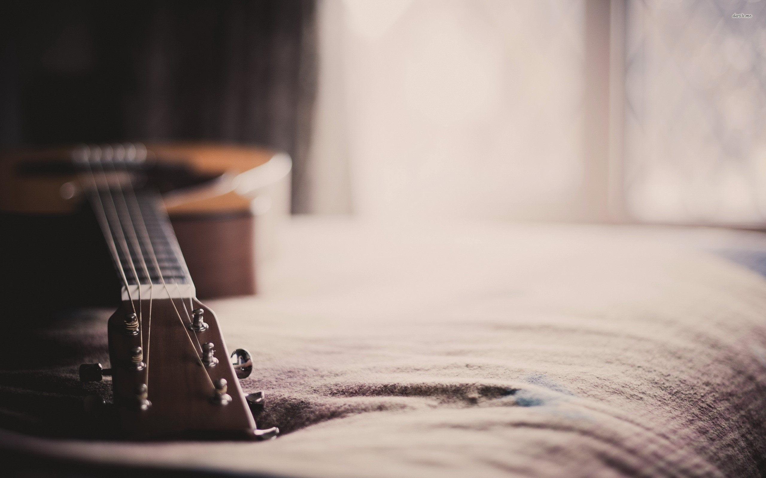 Guitar On The Bed Wallpaper