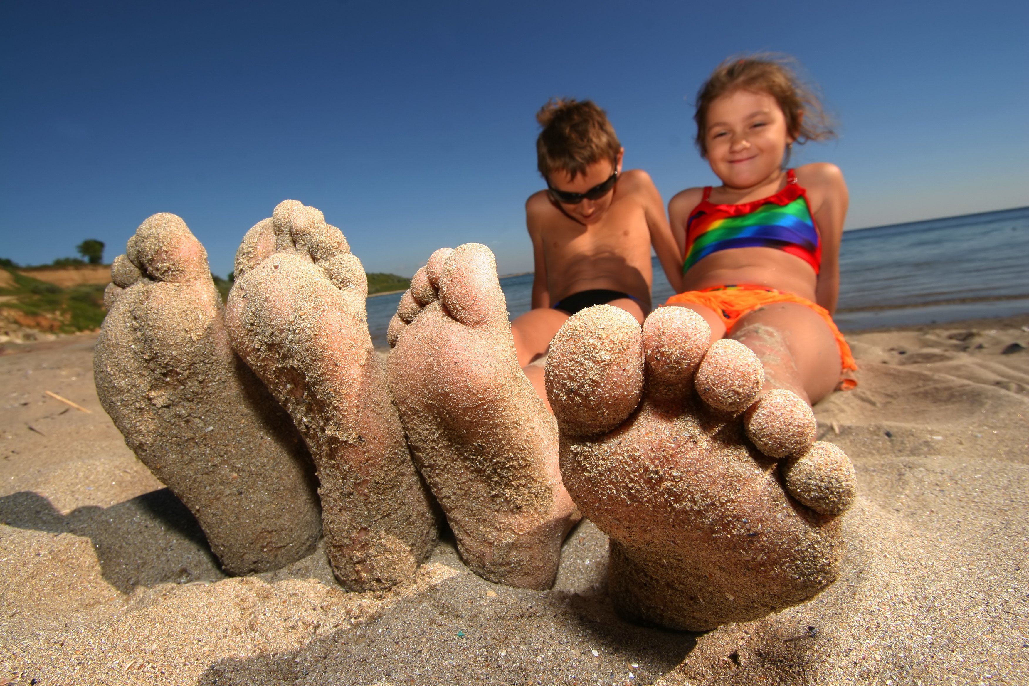 Kids Feet At Beach