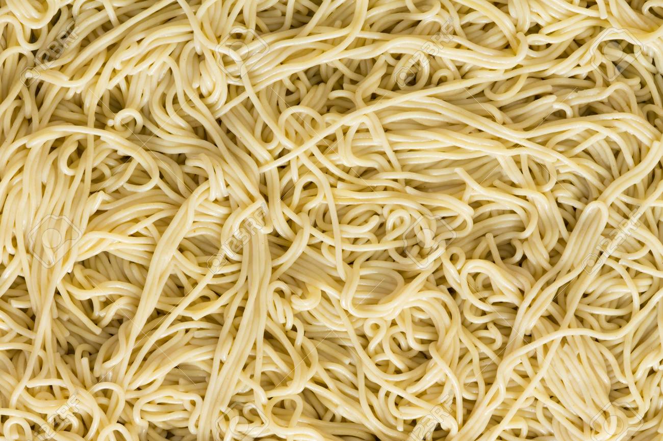 Italian Spaghetti Pasta Background Texture With A Jumbled Pattern
