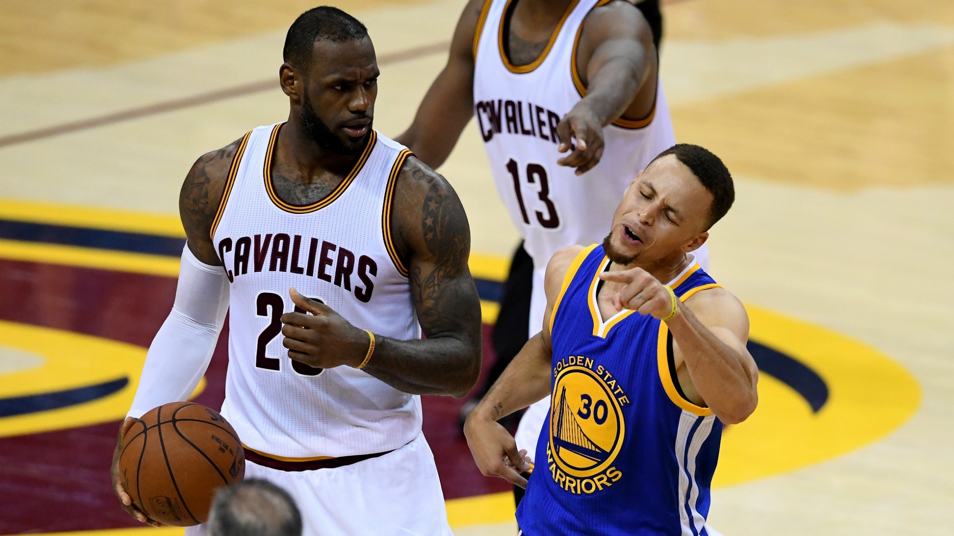 LeBron James and Stephen Curry face off during an intense NBA game
