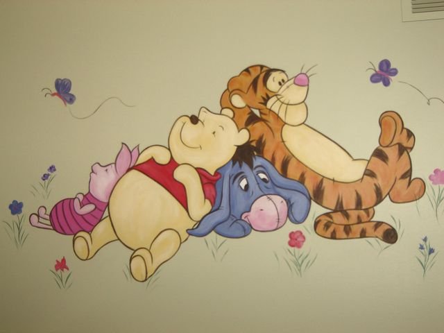 Winnie the Pooh Friends compliments the wallpaper border along the