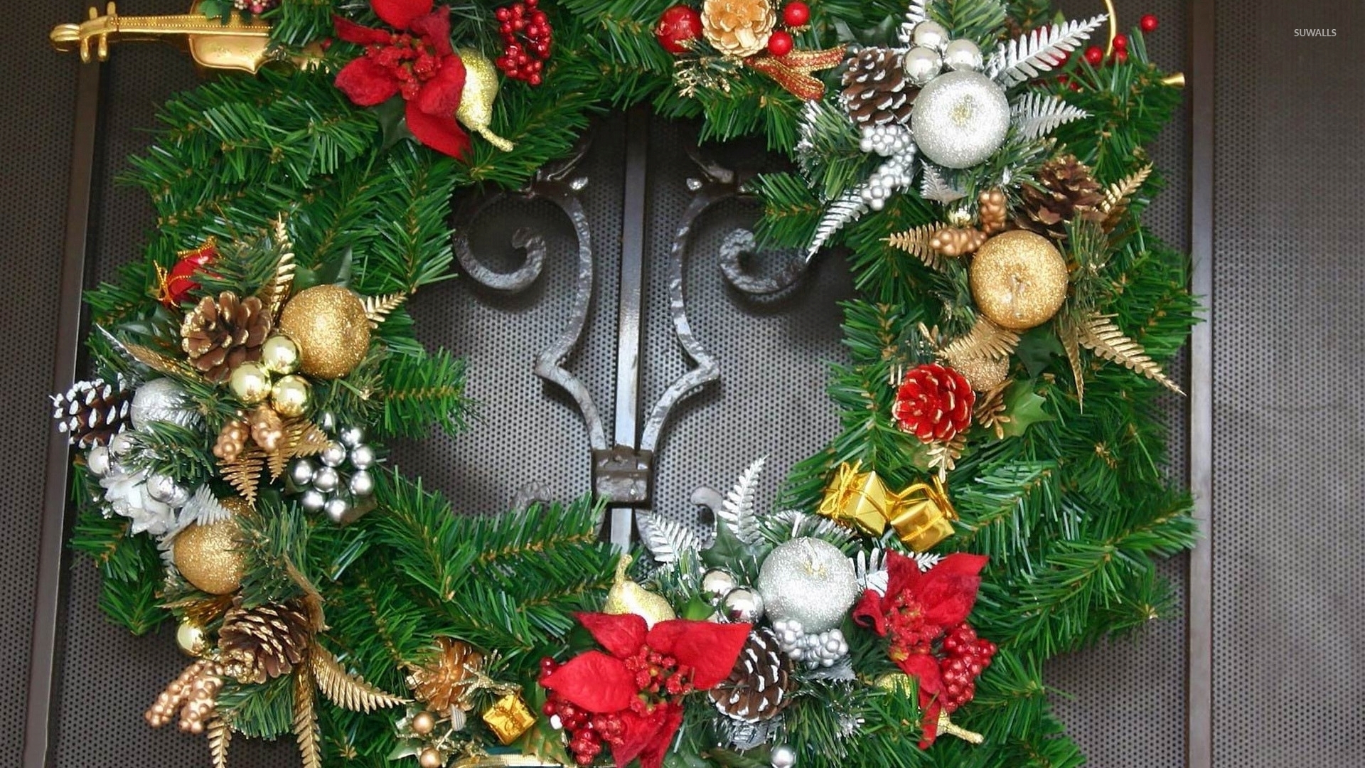 Christmas Wreath On The Gray Door Wallpaper Holiday