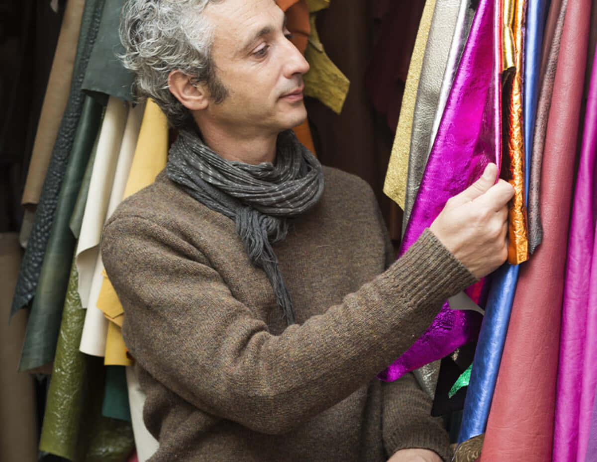 J R Me Dreyfuss Looking At Fabrics Wallpaper