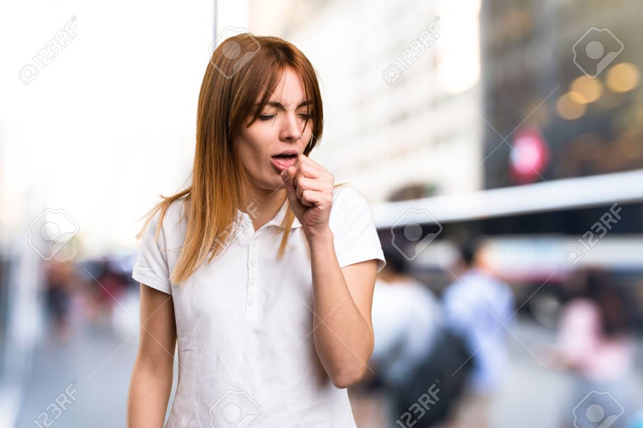 Beautiful Young Girl Coughing A Lot On Unfocused Background Stock