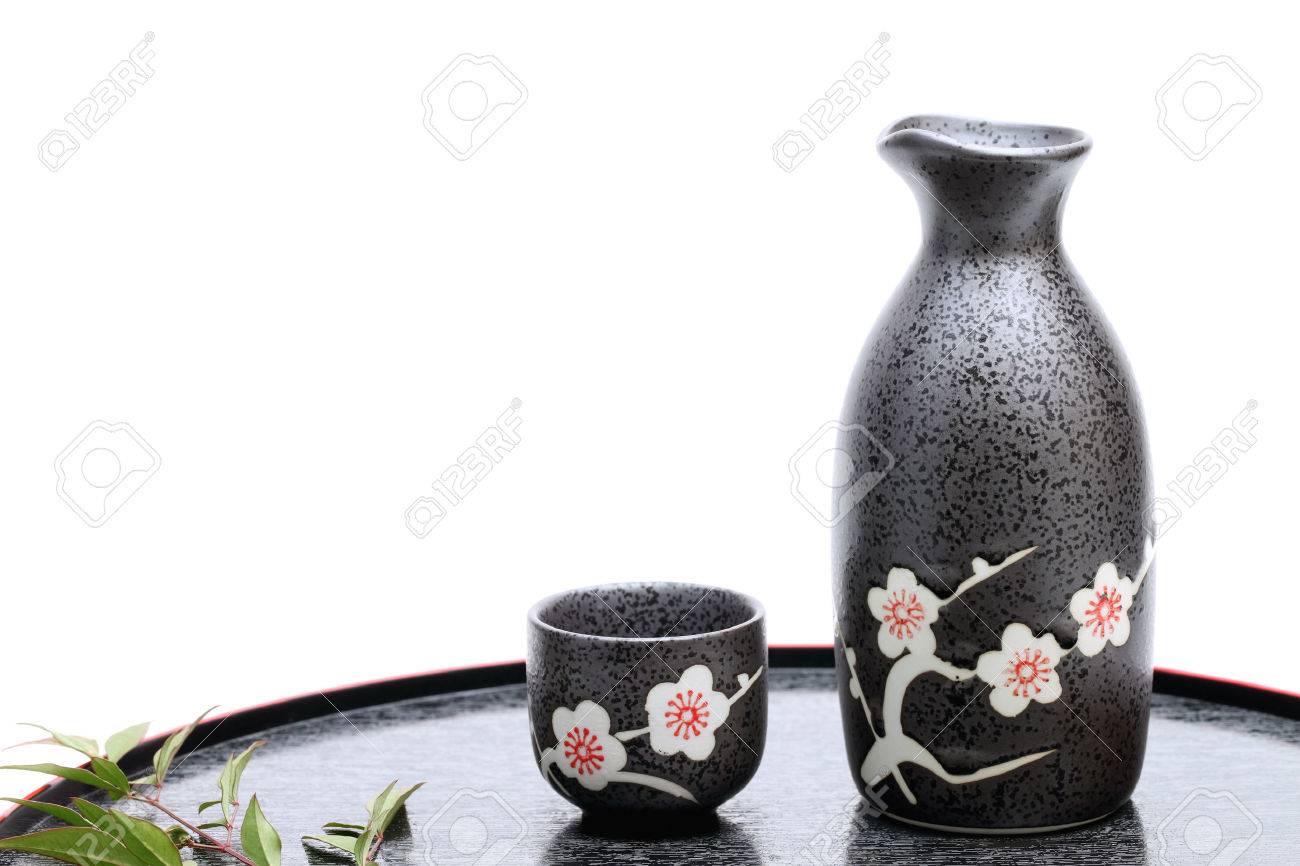 Traditional Japanese Sake Cup And Bottle On White Background Stock