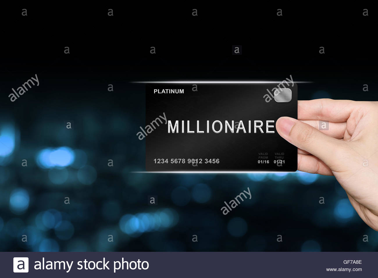 Hand Picking Millionaire Platinum Card On Blur Background Stock