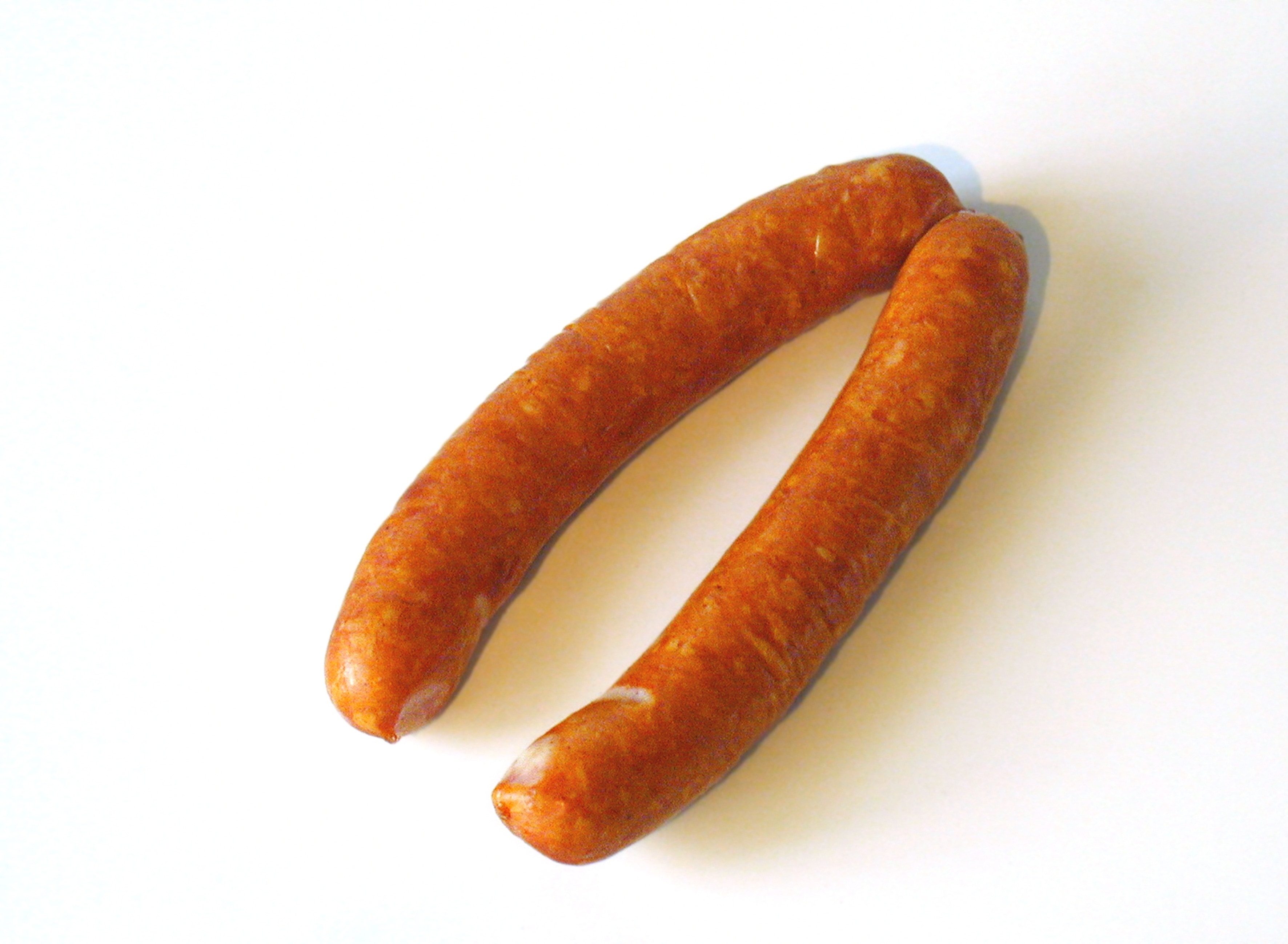 Two Sausage On White Surface Image