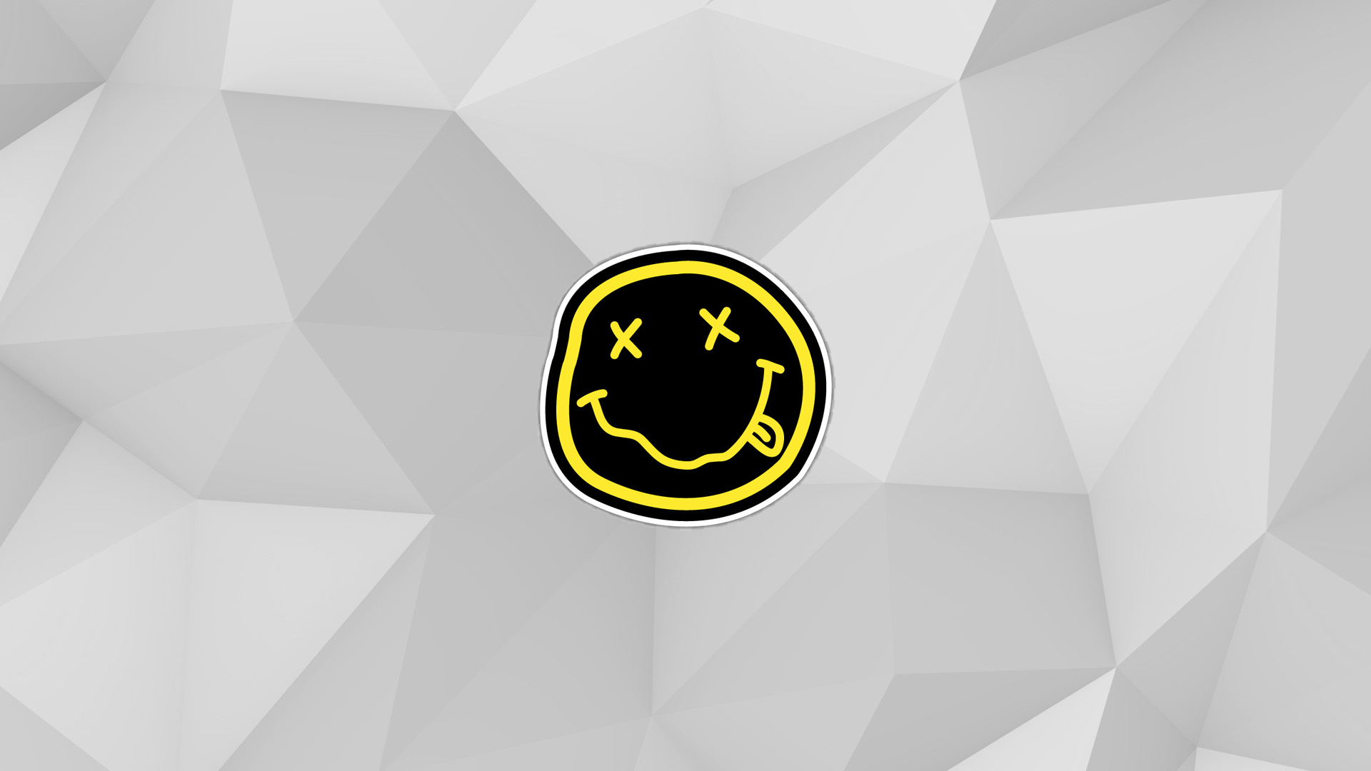Nirvana Smiley Face Logo on White Polygon Background