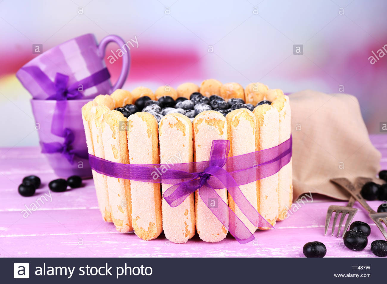 Tasty Cake Charlotte With Blueberries On Wooden Table Light