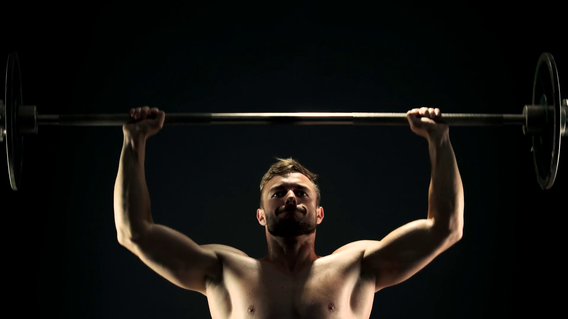 Young Sportsman Lifting Heavy Barbell Hard Training Of