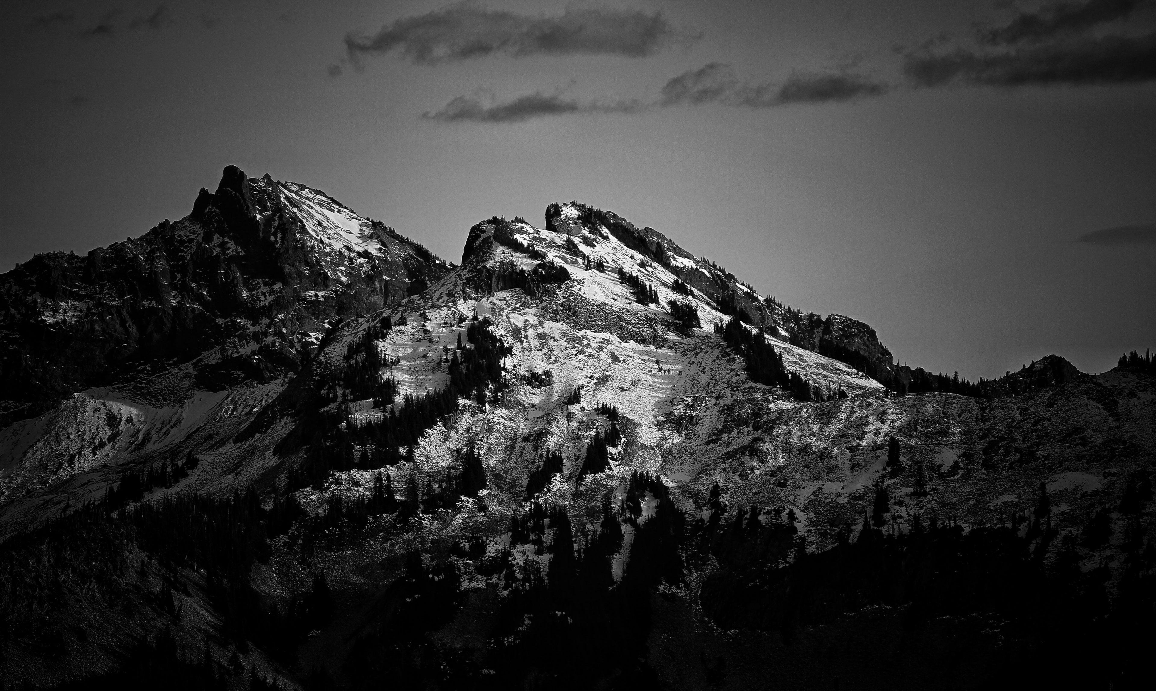 Black Mountain Surrounded With Cloudy Sky Wallpaper
