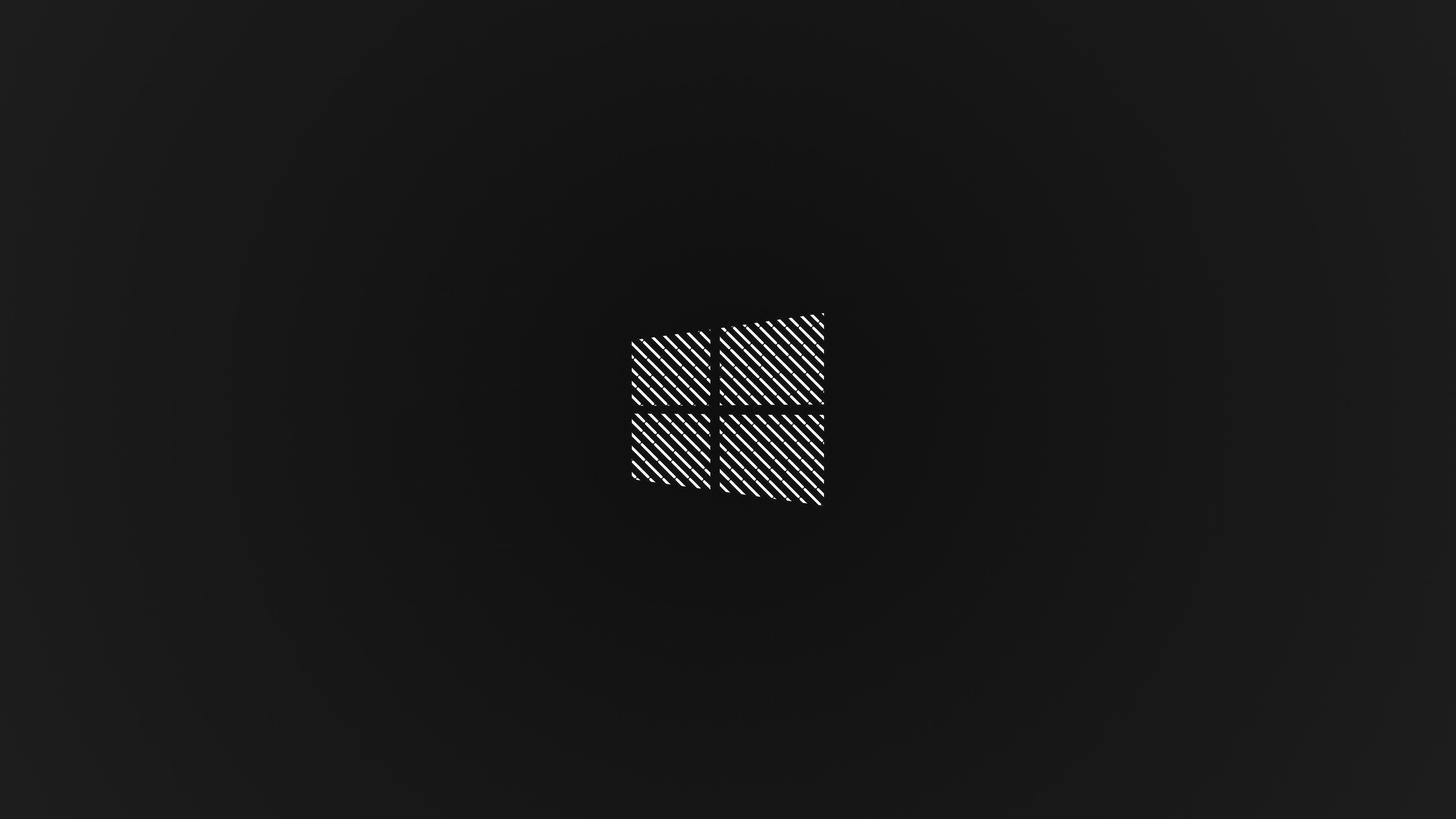 Minimalist Windows logo on a dark background