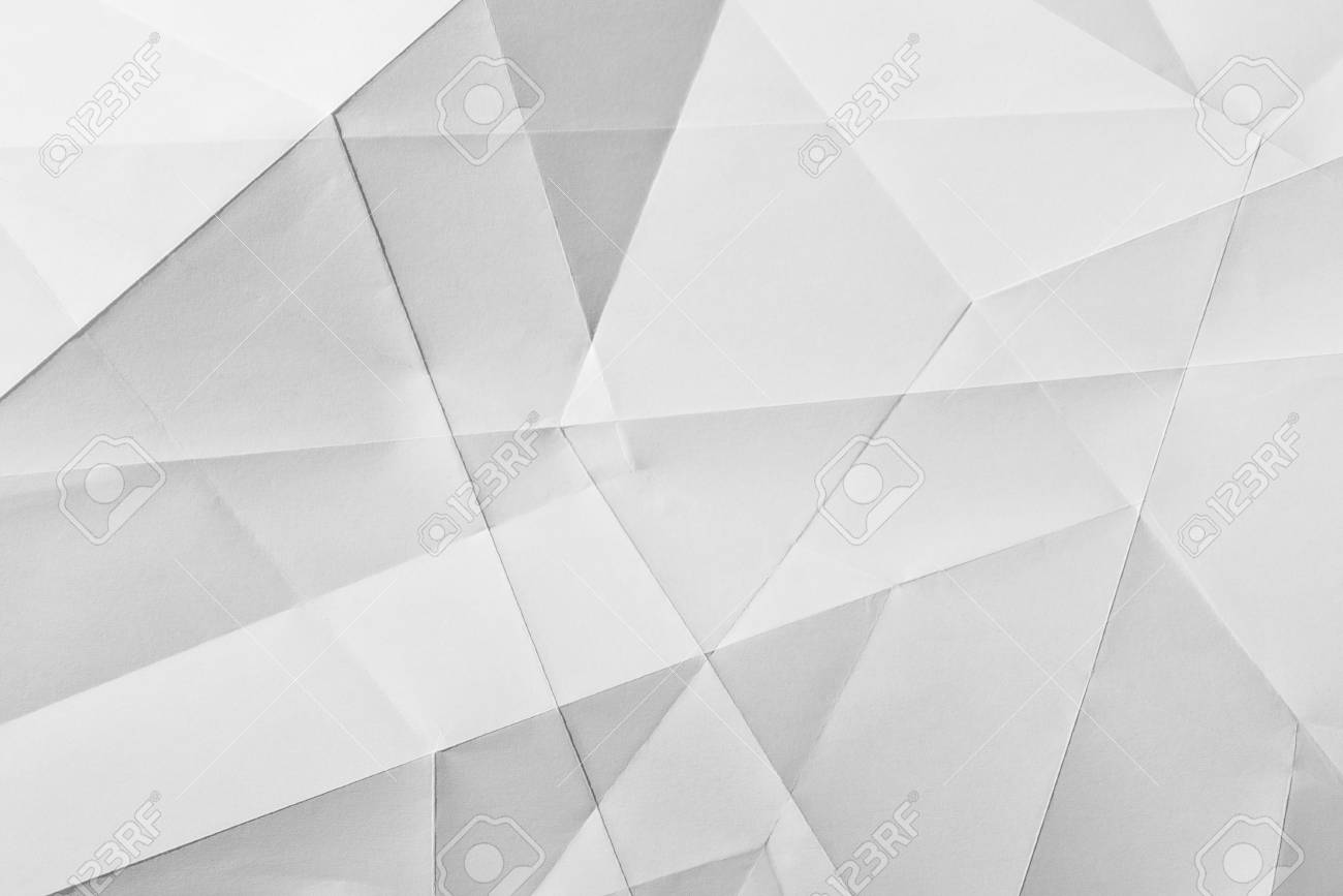 White Folded Sheet Of Paper Showing An Abstract Texture Design