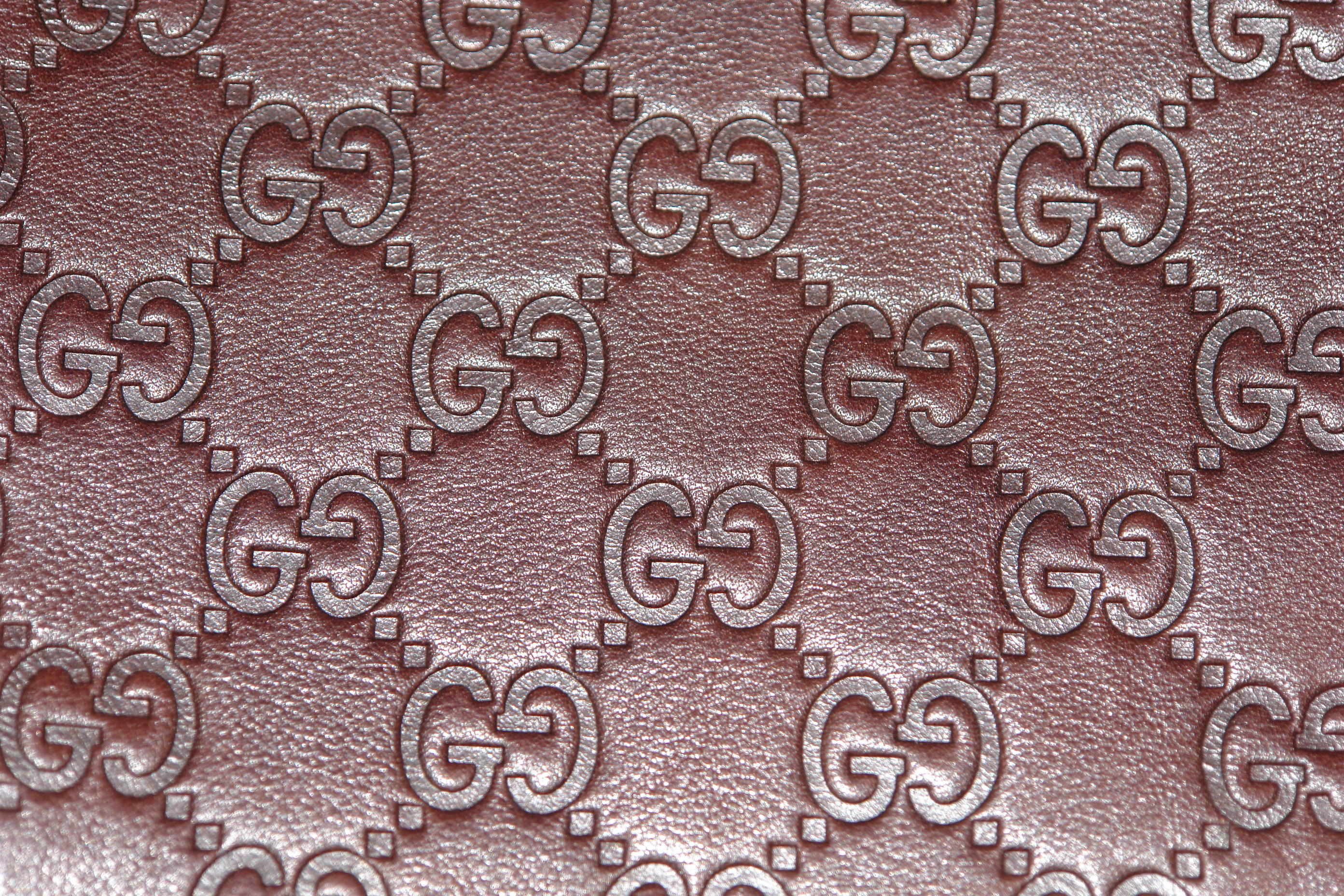 Close-up of Rose Gold Gucci GG Pattern