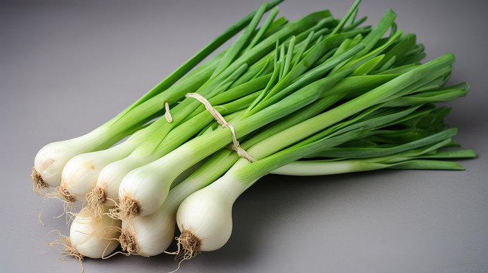 Green Onion Bunch Of Onions On A Grey Background Wallpaper
