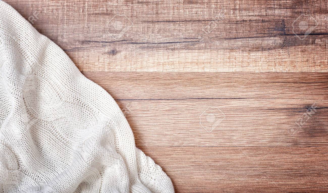 White Knitted Blanket On Wooden Background Stock Photo Picture